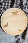 maaterra compostable palm leaf plate with butterfly wreath design.