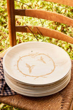 maaterra compostable palm leaf plate with hummingbird wreath design.