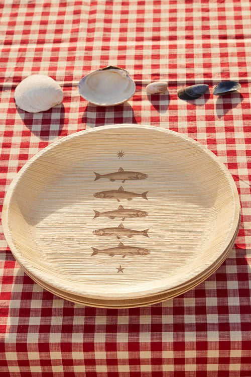 maaterra compostable palm leaf plate with stacked fish design.