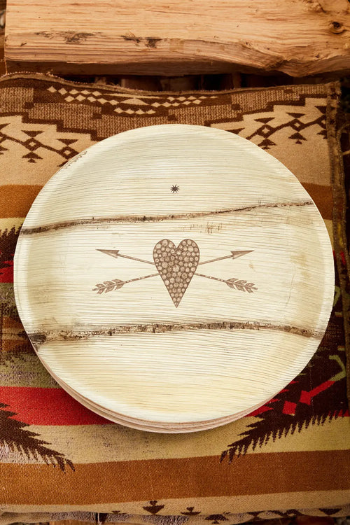 maaterra compostable palm leaf plate with stone heart design.
