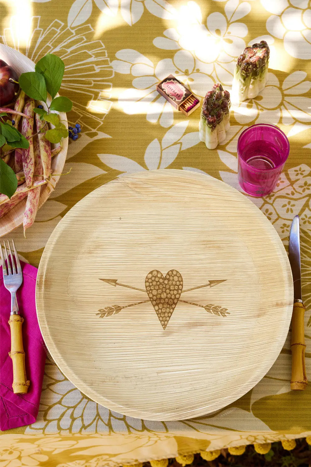 maaterra compostable palm leaf plate with stone heart design