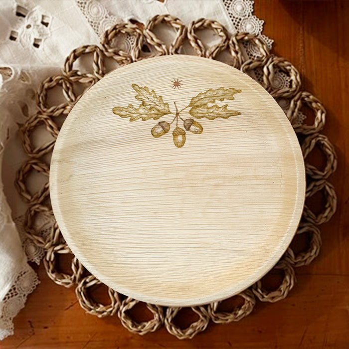 maaterra compostable palm leaf plate with acorn design.