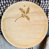 maaterra compostable palm leaf plate with holiday Holly design.