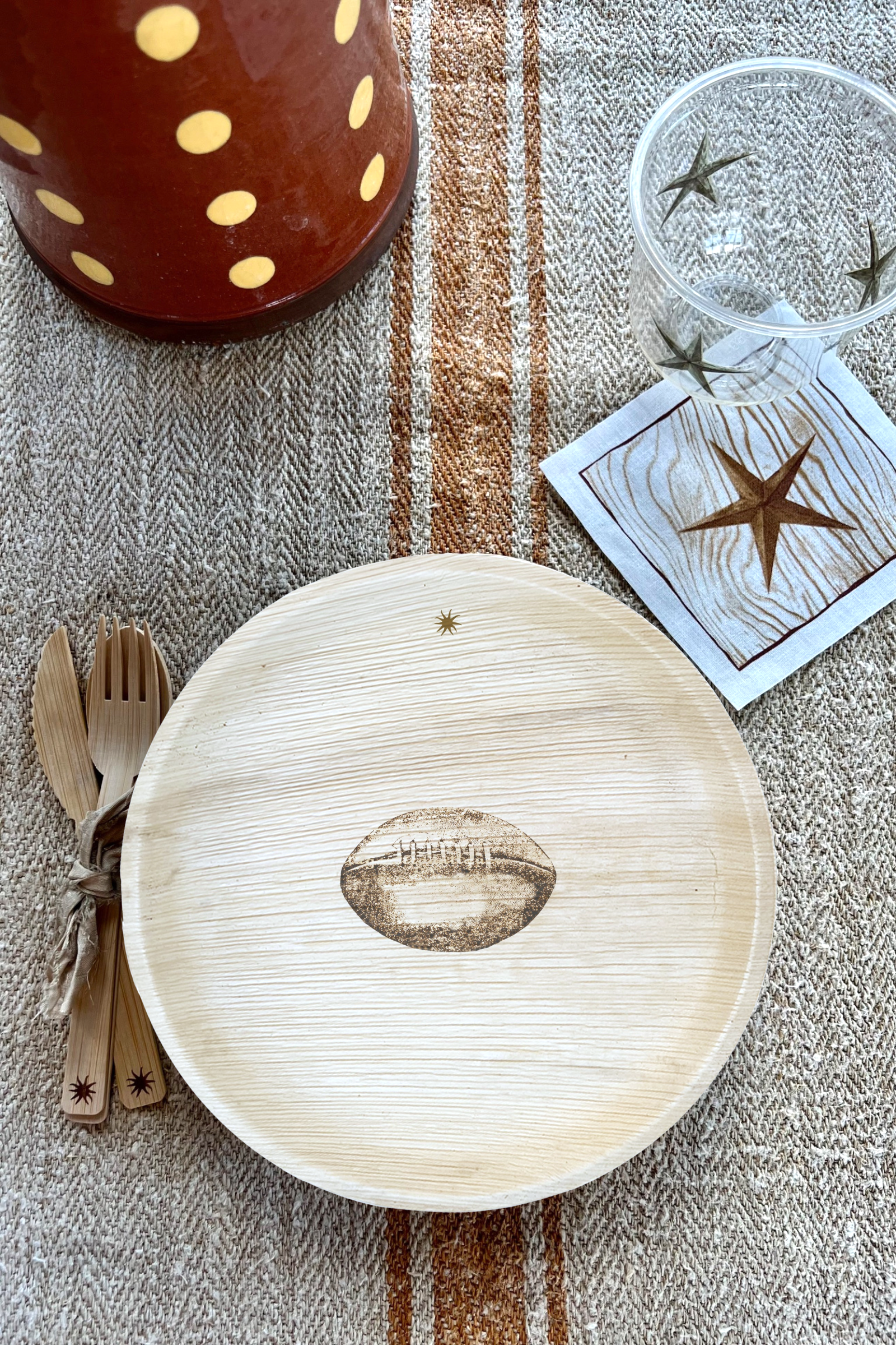 maaterra compostable palm leaf plate with tailgate design.
