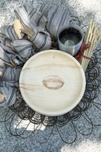 maaterra compostable palm leaf plate with tailgate design.