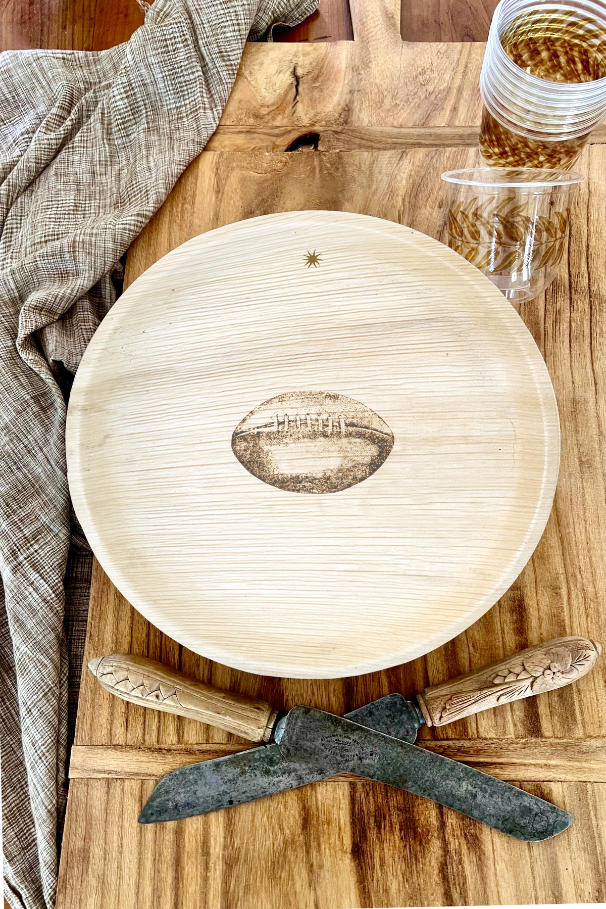 maaterra compostable palm leaf plate with tailgate design.