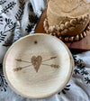 maaterra compostable palm leaf plate with stone heart design.