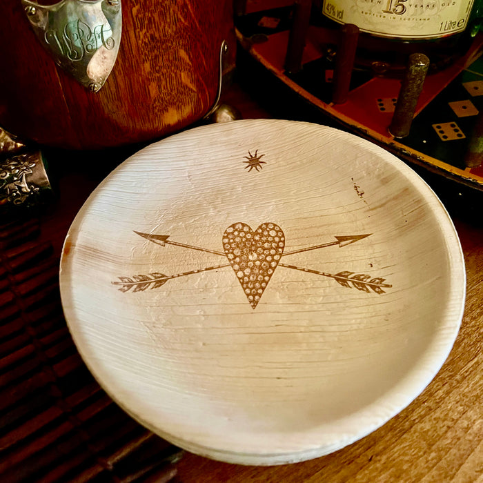 maaterra compostable palm leaf plate with stone heart design.