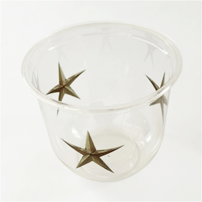 maaterra compostable cup tilted with treasured star design on a white background