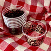 maaterra compostable cups with classic tortoise design on a gingham table setting