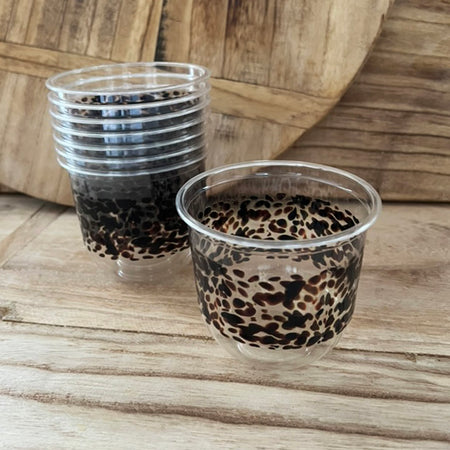 maaterra compostable cups with classic tortoise design on a wooden table