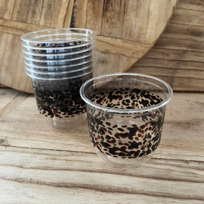 maaterra compostable cups with classic tortoise design on a wooden table