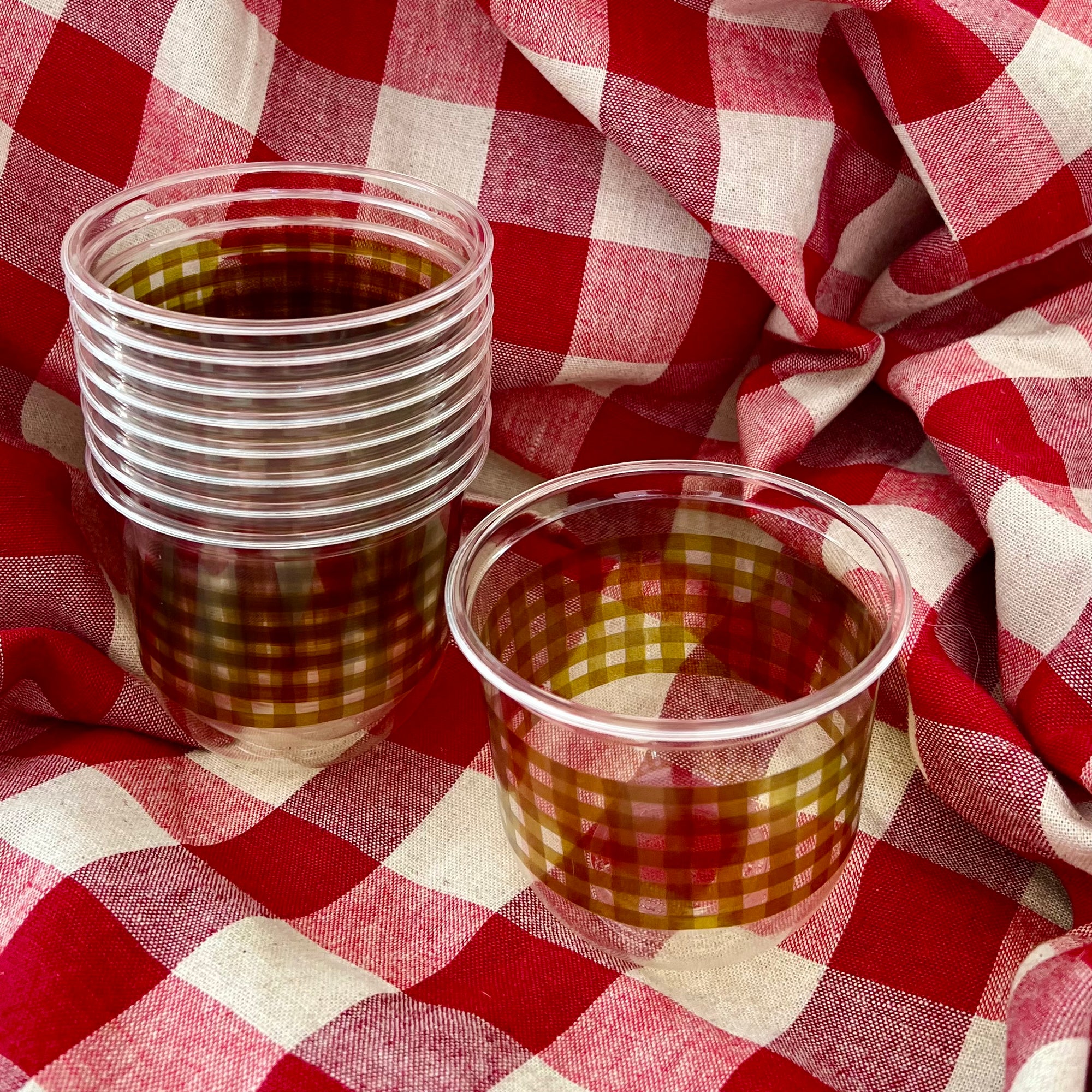 maaterra compostable cups with moss gingham design on a gingham background