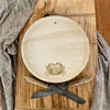 maaterra compostable palm leaf plate with crab design on a cutting board