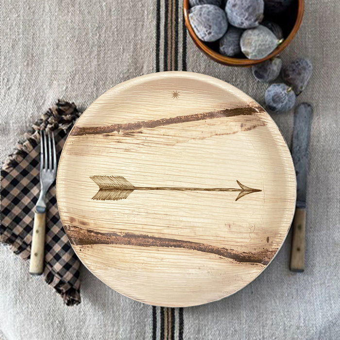 maaterra compostable palm leaf plate with single arrow design on a white tablecloth