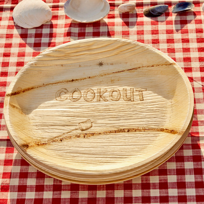 maaterra compostable plate with COOKOUT design on a gingham tablecloth
