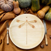 maaterra compostable plate with dragonfly design on a fall-inspired table