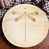 maaterra compostable plate with dragonfly design on blue and white tablecloth
