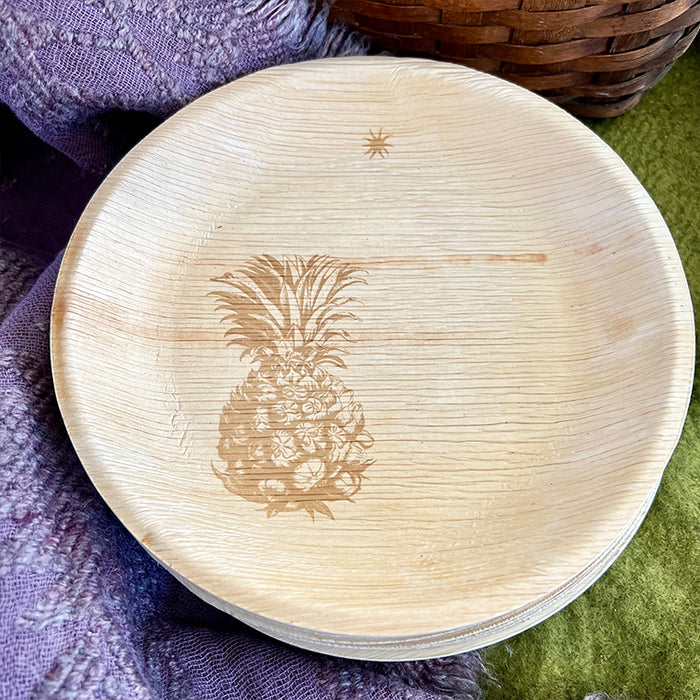 maaterra compostable plate with fresh pineapple design on a purple and green tablecloth