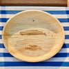 maaterra compostable plate with whale tale design on blue and white tablecloth