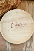maaterra compostable plates with congrats design.