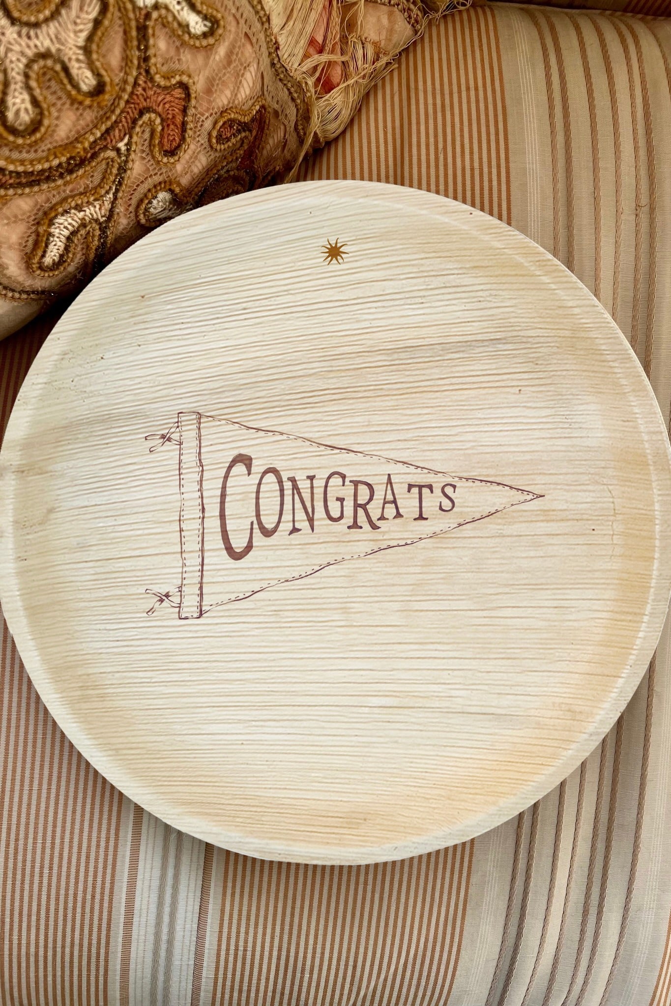 maaterra compostable plates with congrats design.