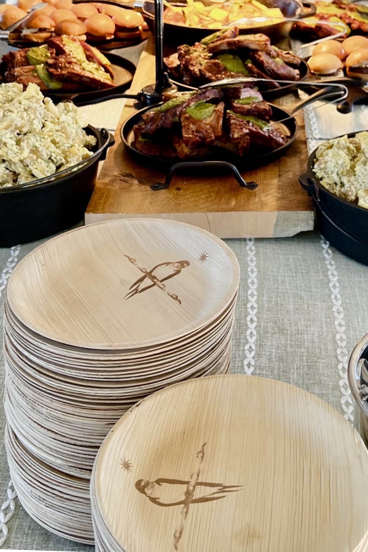 maaterra compostable plate with custom byrd design at a barbecue event. 