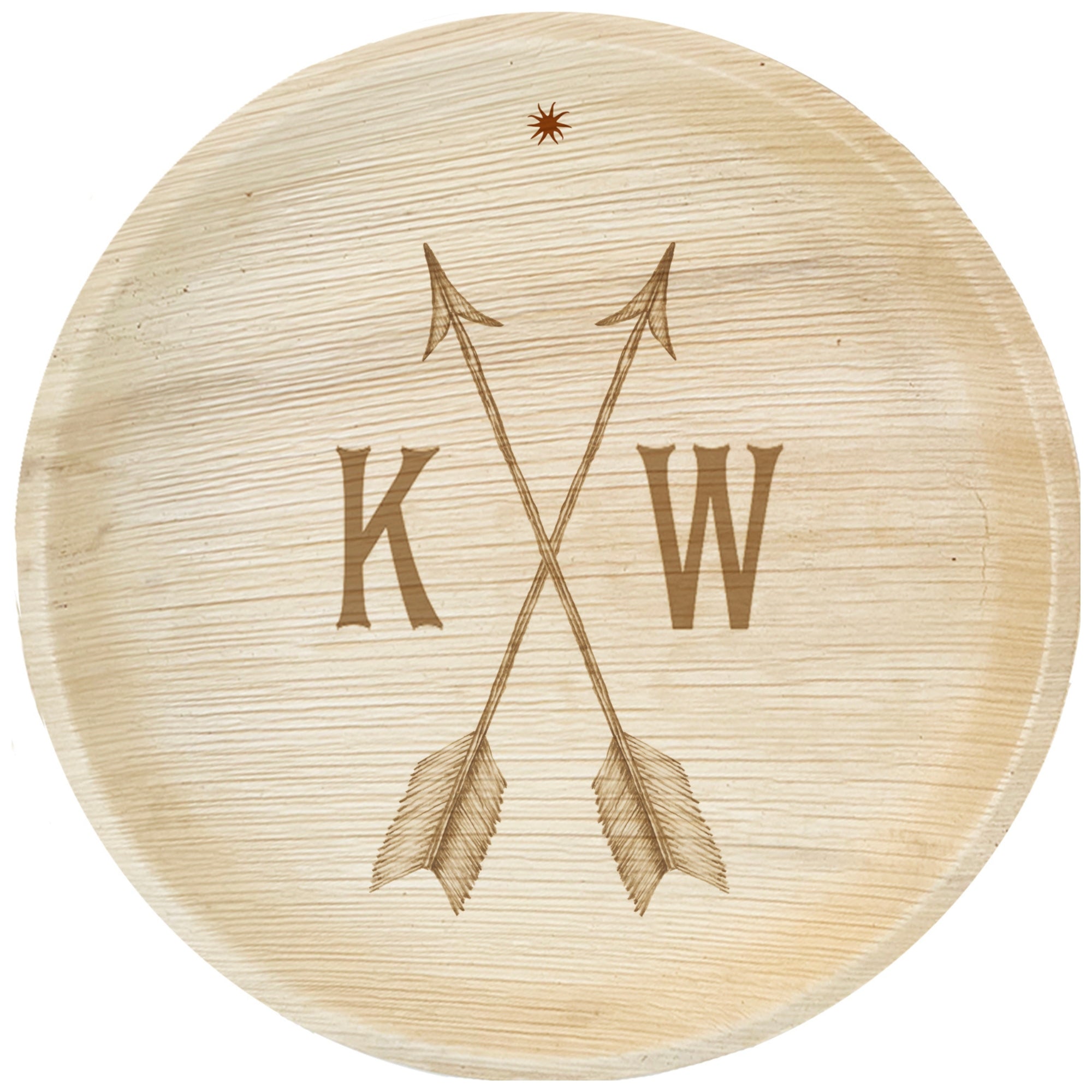 maaterra compostable palm leaf plate with custom crossed arrows engraving on a white background. 