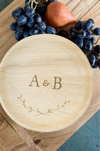 maaterra compostable plate with custom crossed branches design on a breadboard. 