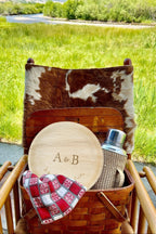 maaterra compostable plate with custom crossed branches design in a picnic basket.