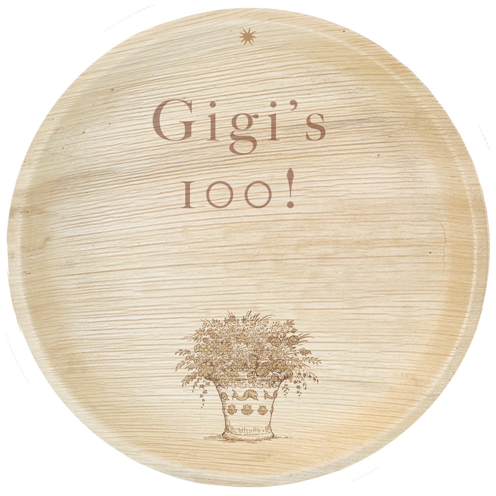maaterra compostable palm leaf plate with custom Gigi's 100 engraving over white background.