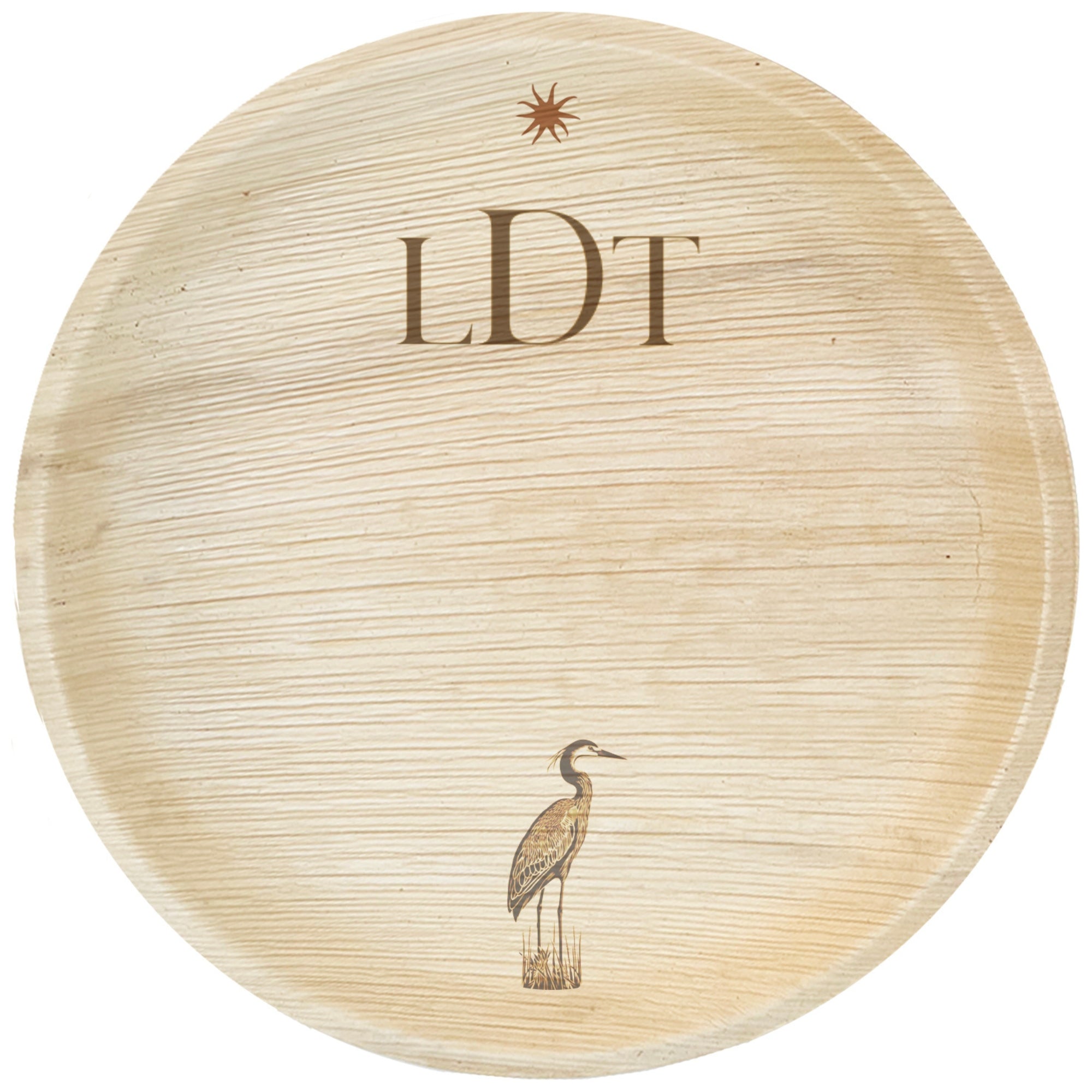 maaterra compostable palm leaf plate with custom LDT engraving over white background.
