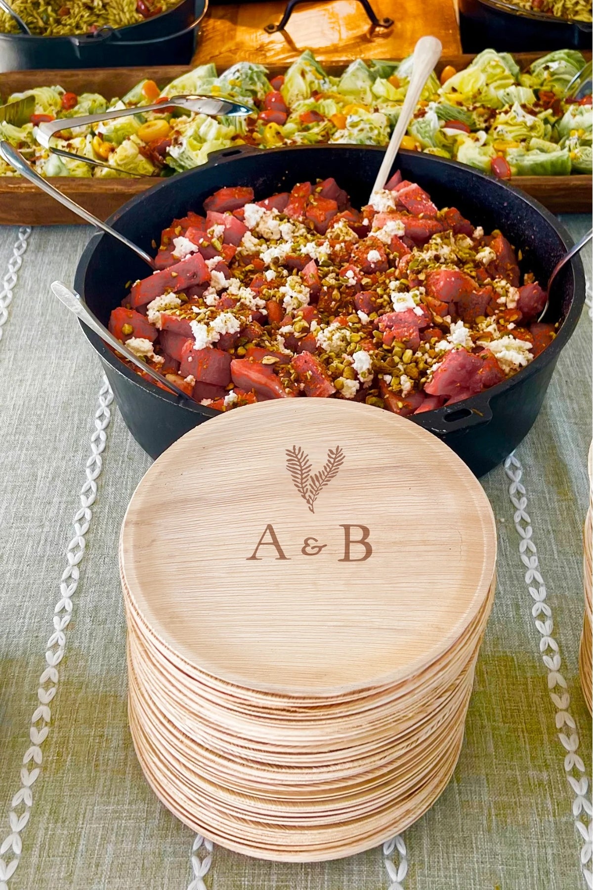 maaterra compostable plate with custom leaf heart design at an event.