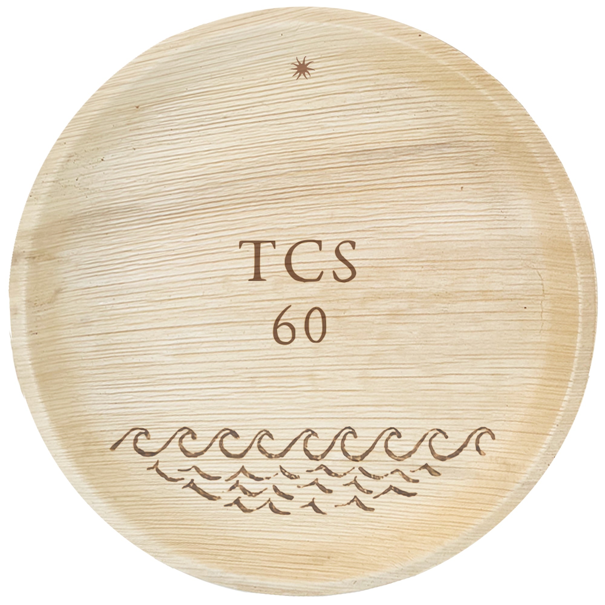 maaterra compostable palm leaf plate with custom ocean waves engraving over white background.
