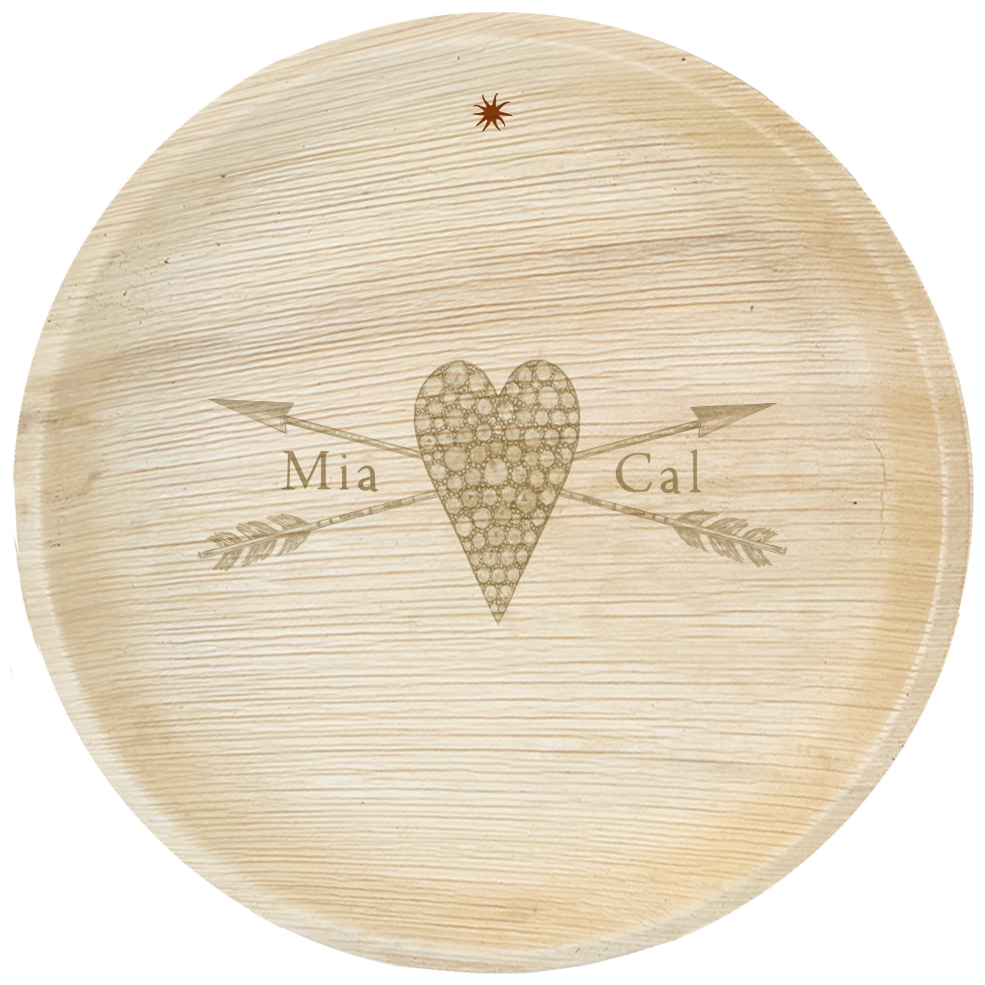 maaterra compostable palm leaf plate with stone heart engraving over white background.
