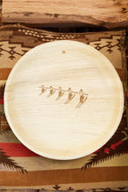 maaterra compostable palm leaf plate with a high five design on a pillow.