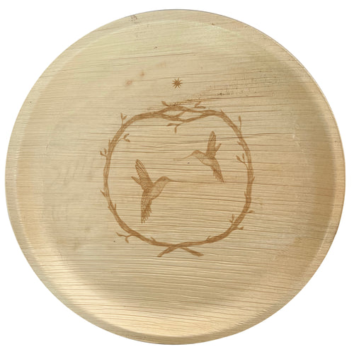 White background. maaterra compostable palm leaf plate with hummingbird wreath design.