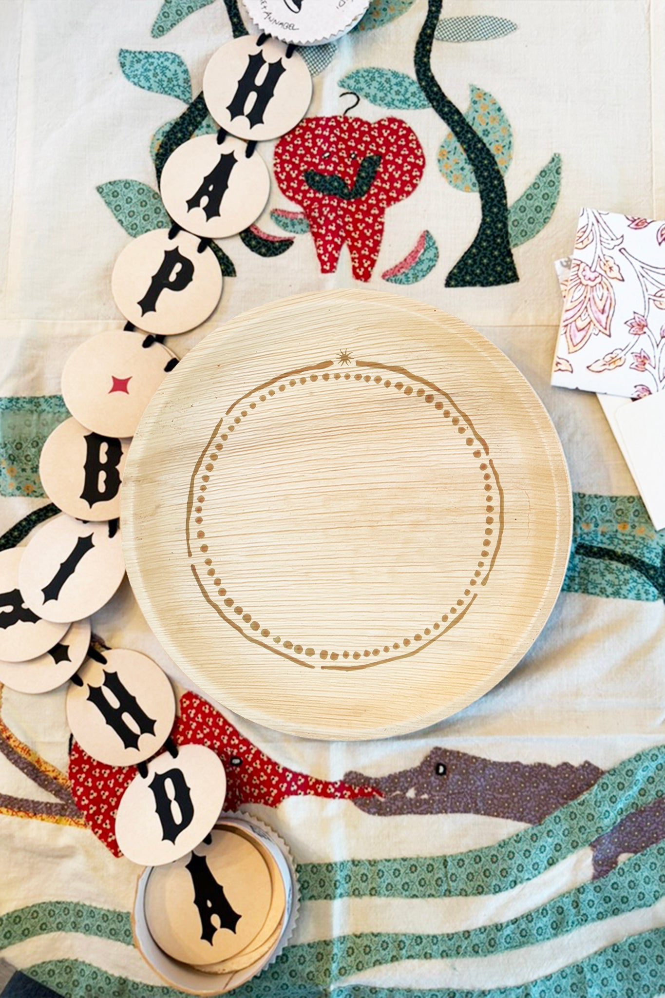 maaterra compostable plate with round & round design. 