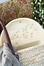 Palm leaf maaterra plate with snow in the summer design and in a basket.
