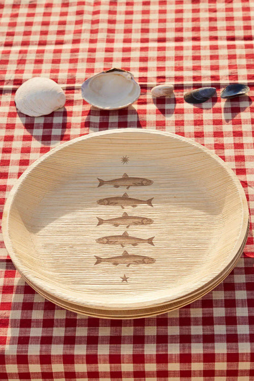 maaterra compostable palm leaf plate with stacked fish design.
