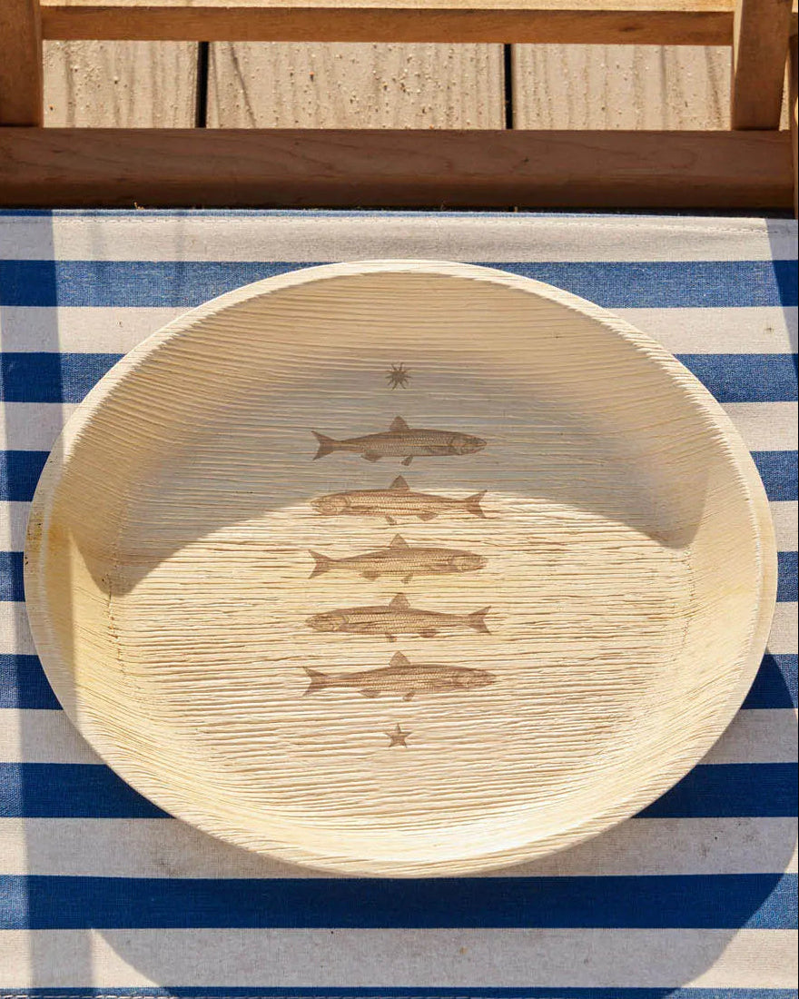 maaterra compostable palm leaf plate with stacked fish design.