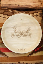 maaterra compostable palm leaf plate with stag party design on a pillow