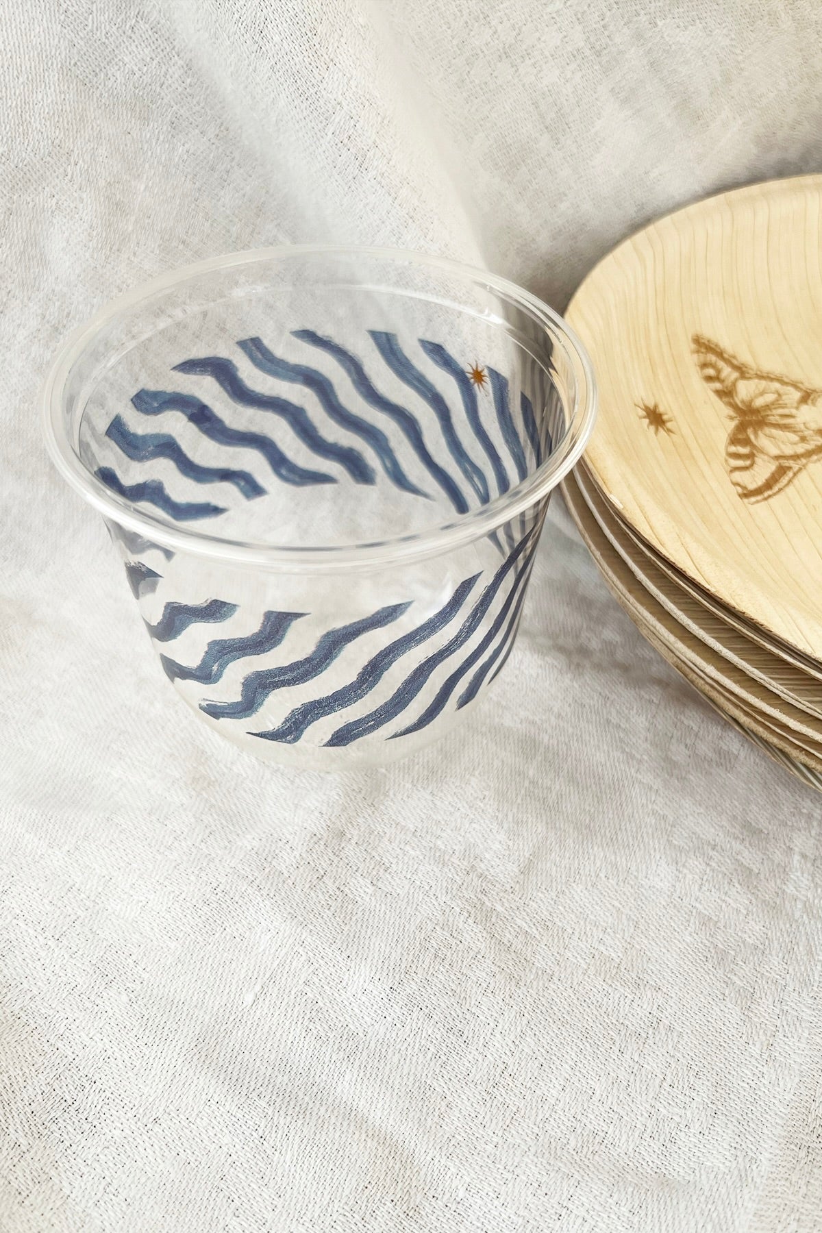 maaterra clear compostable cups with waves design.