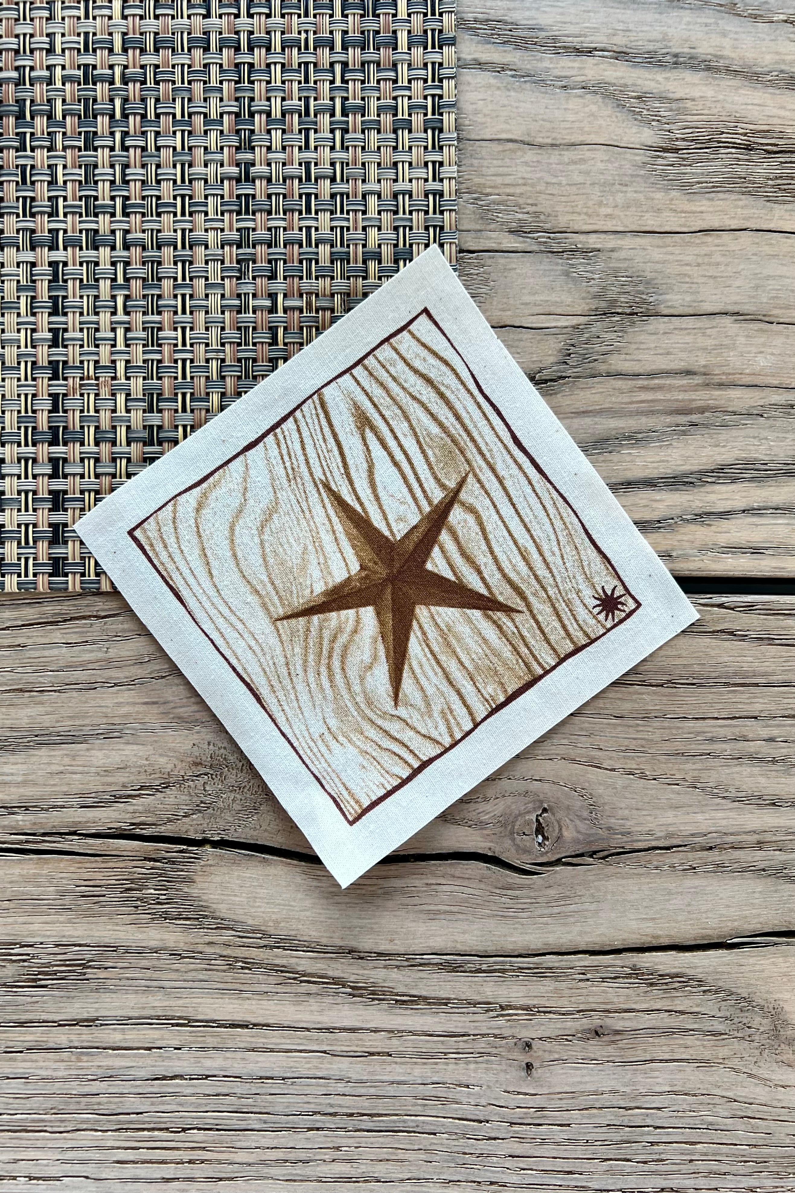 maaterra sustainable cocktail napkin with treasured star design.