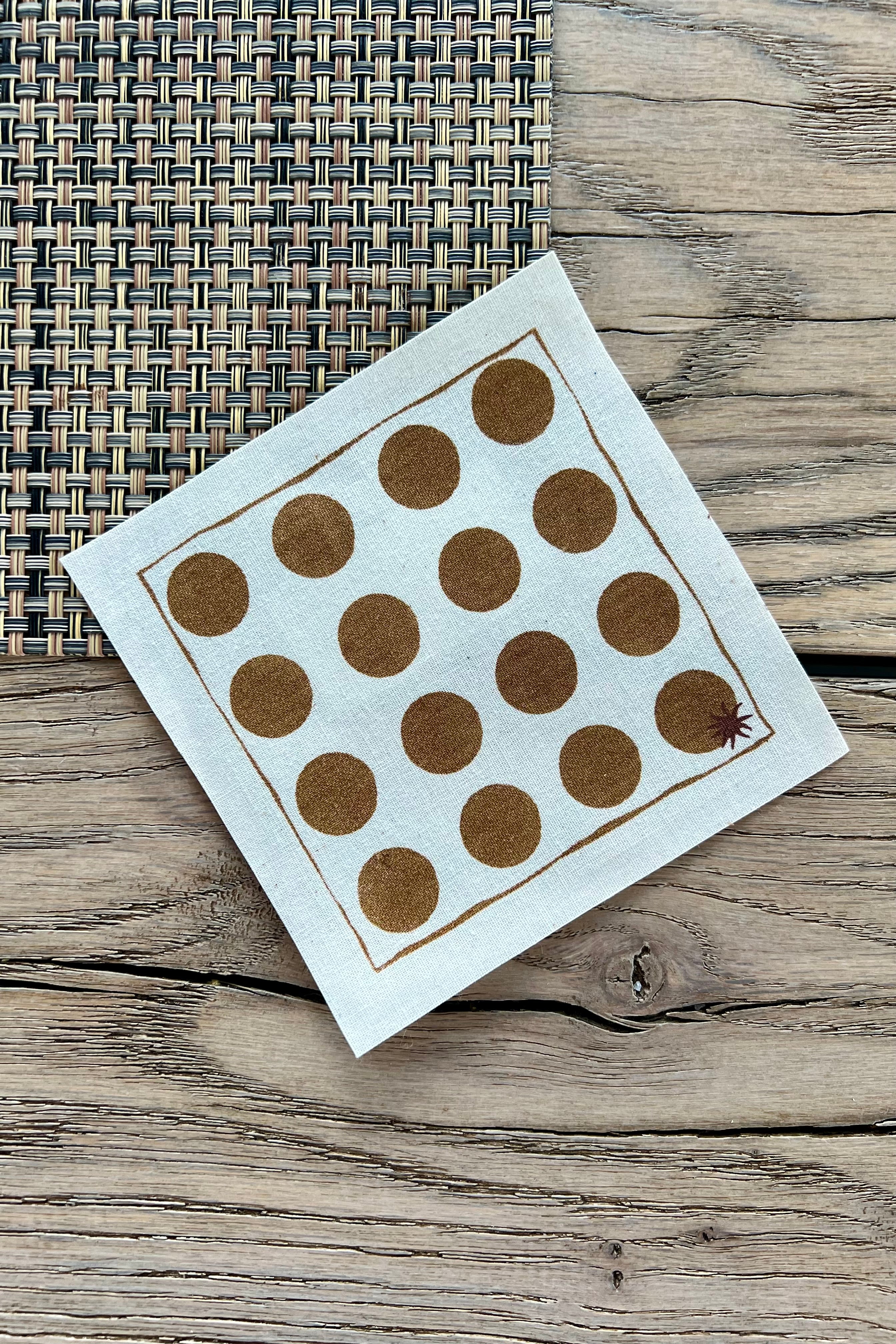 maaterra sustainable cocktail napkin with dots design. 