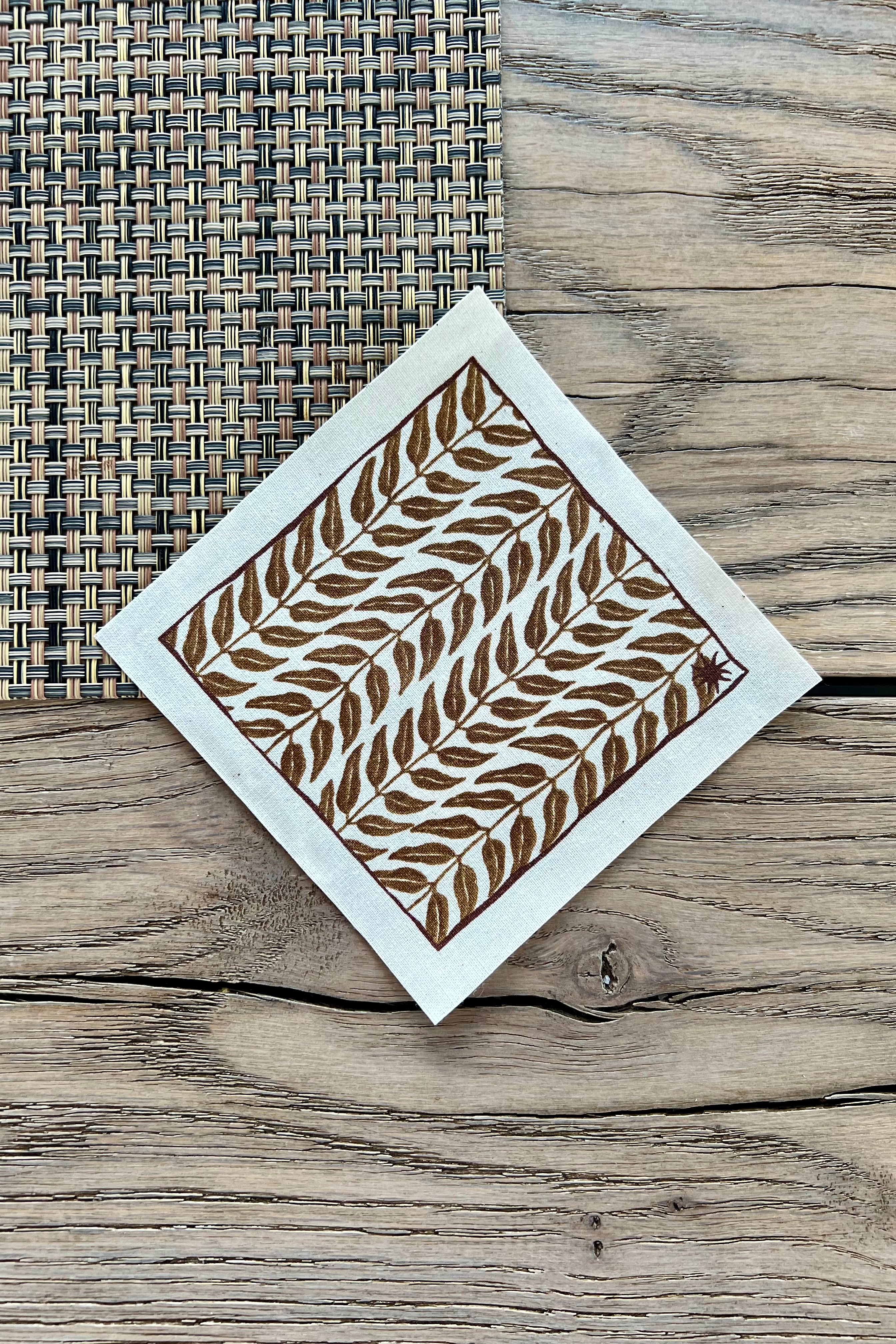 maaterra sustainable cocktail napkins with honey leaves design. 